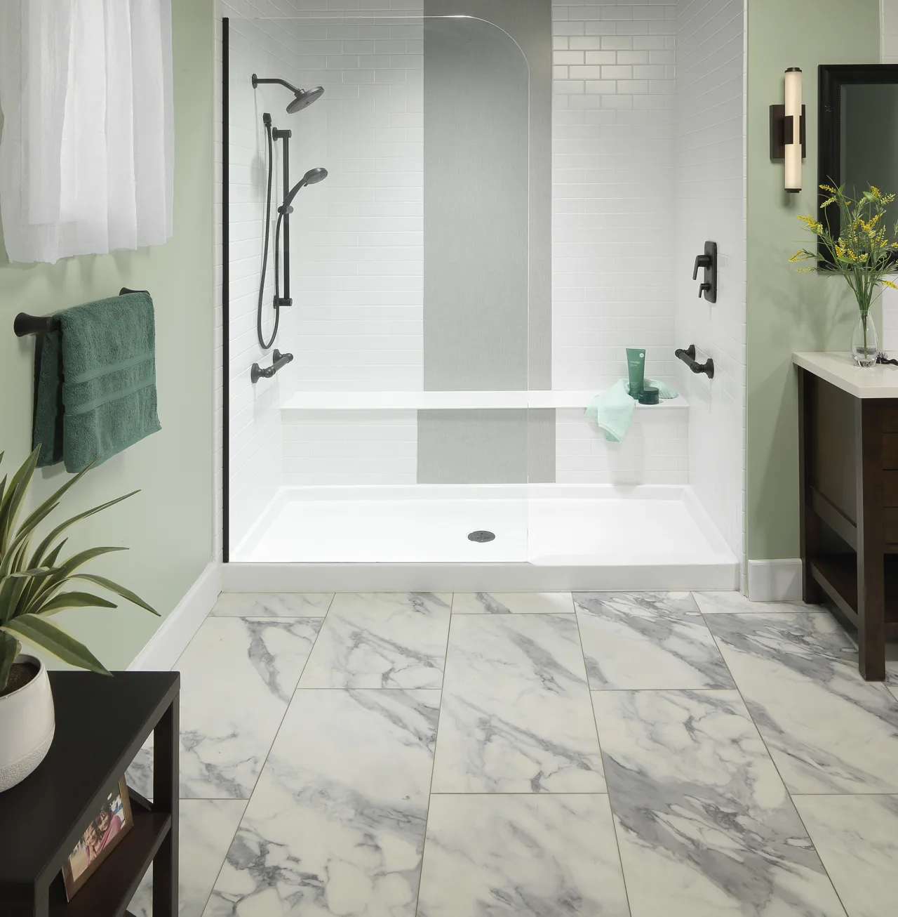 White subway-style walk-in shower with a glass enclosure