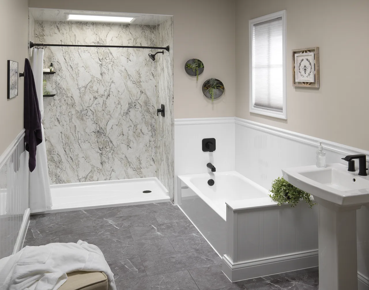 White marble-look shower walls with matte black fixtures
